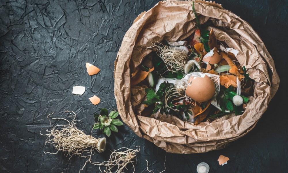 Compost in brown bag on a floor